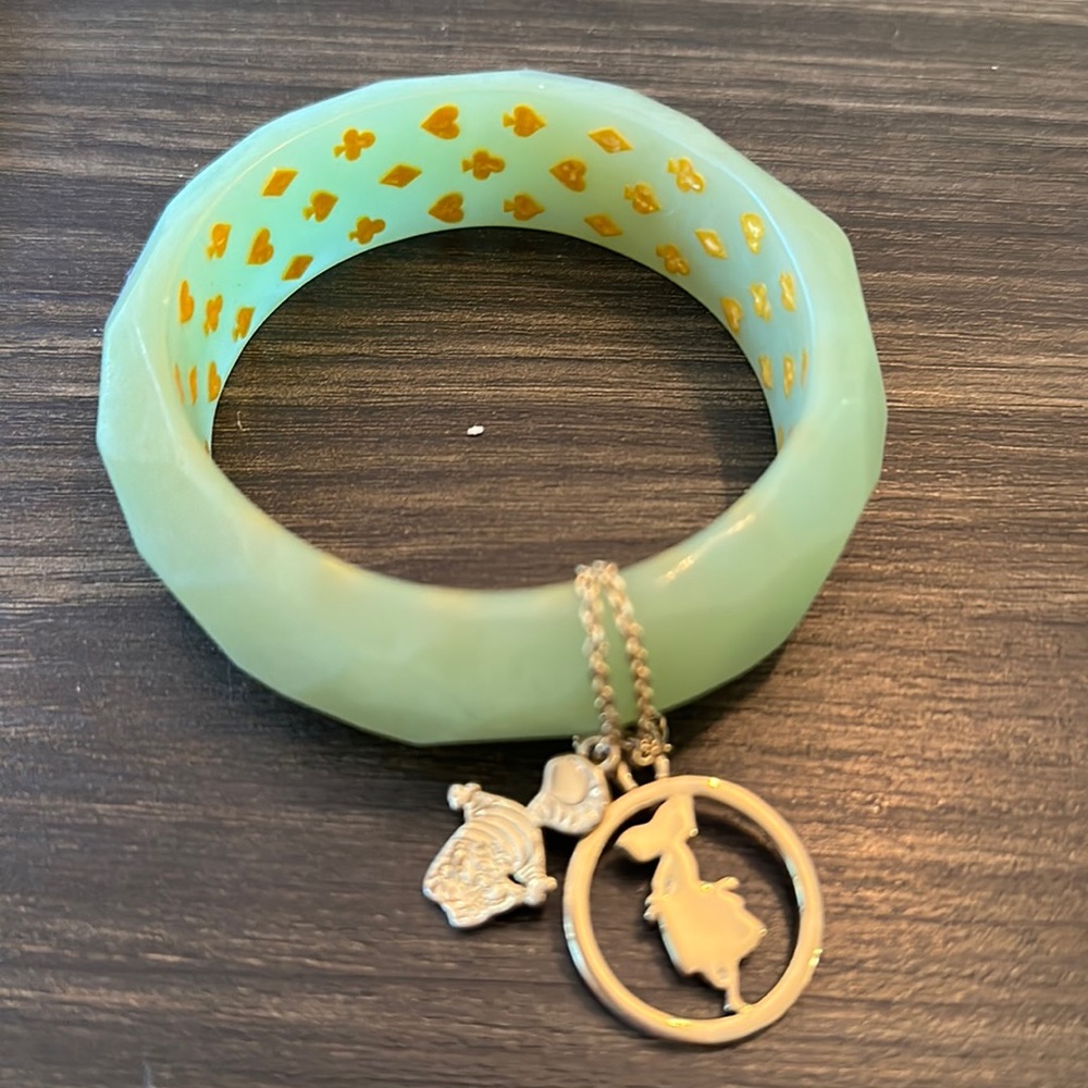 Disney Couture Alice in Wonderland lucite bangle with gold charms OSFM